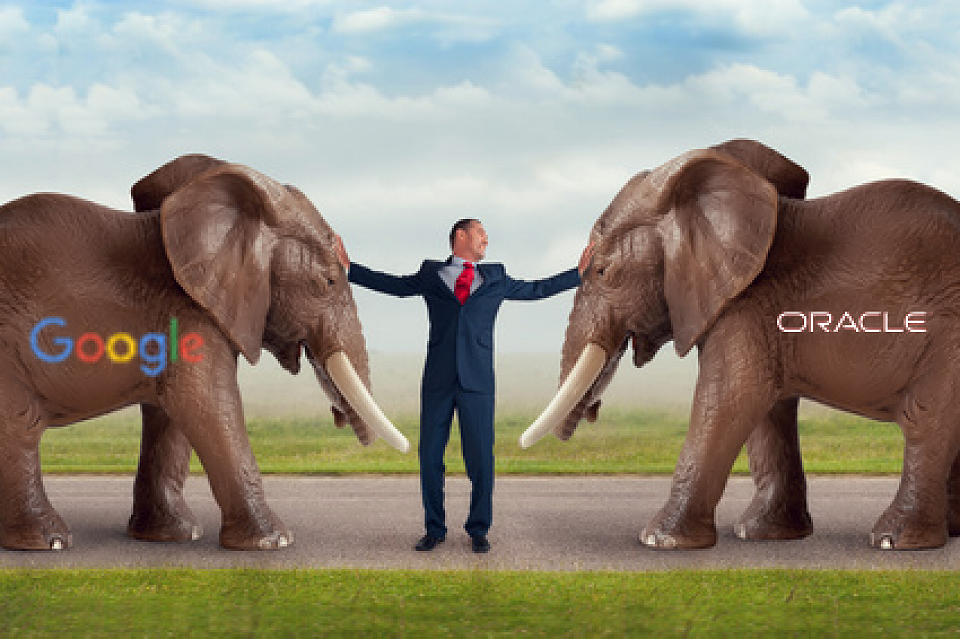 Oracle elephant versus Google elephant with man pushing them apart