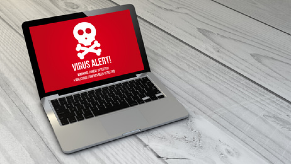 Virus alert on laptop