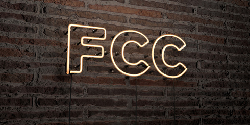 FCC -Realistic Neon Sign on Brick Wall background