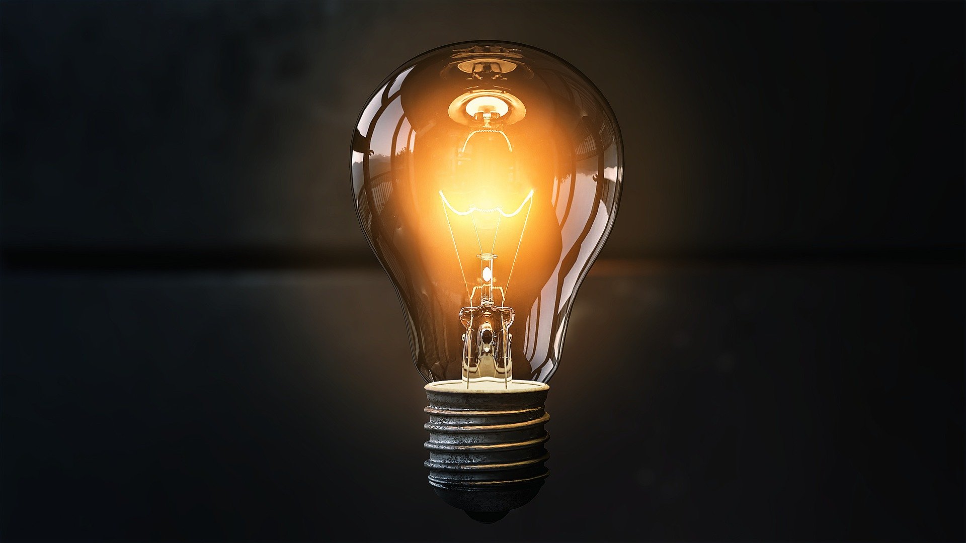 A single light bulb, illuminated