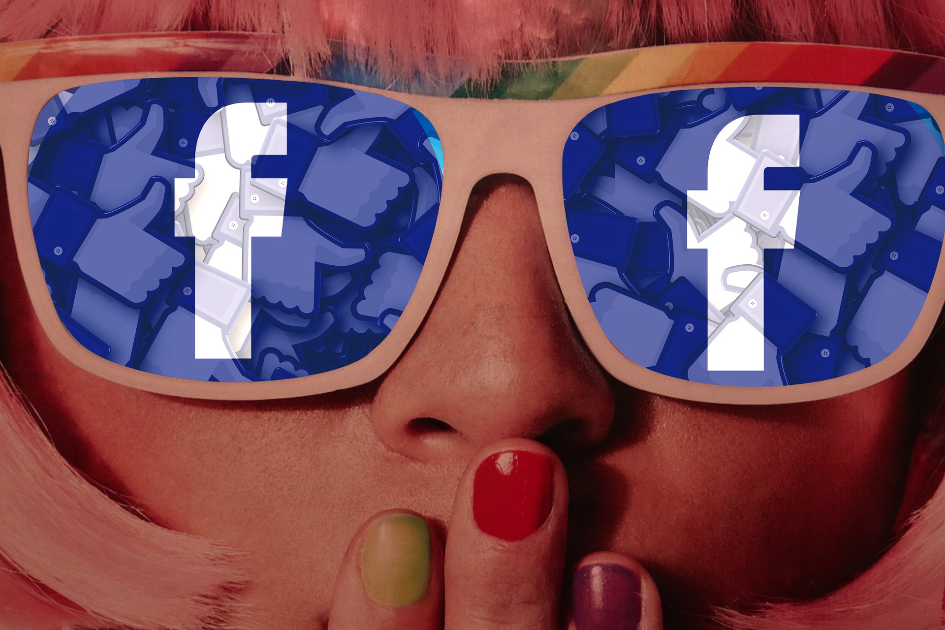 woman wearing sunglasses with facebook logo on lenses