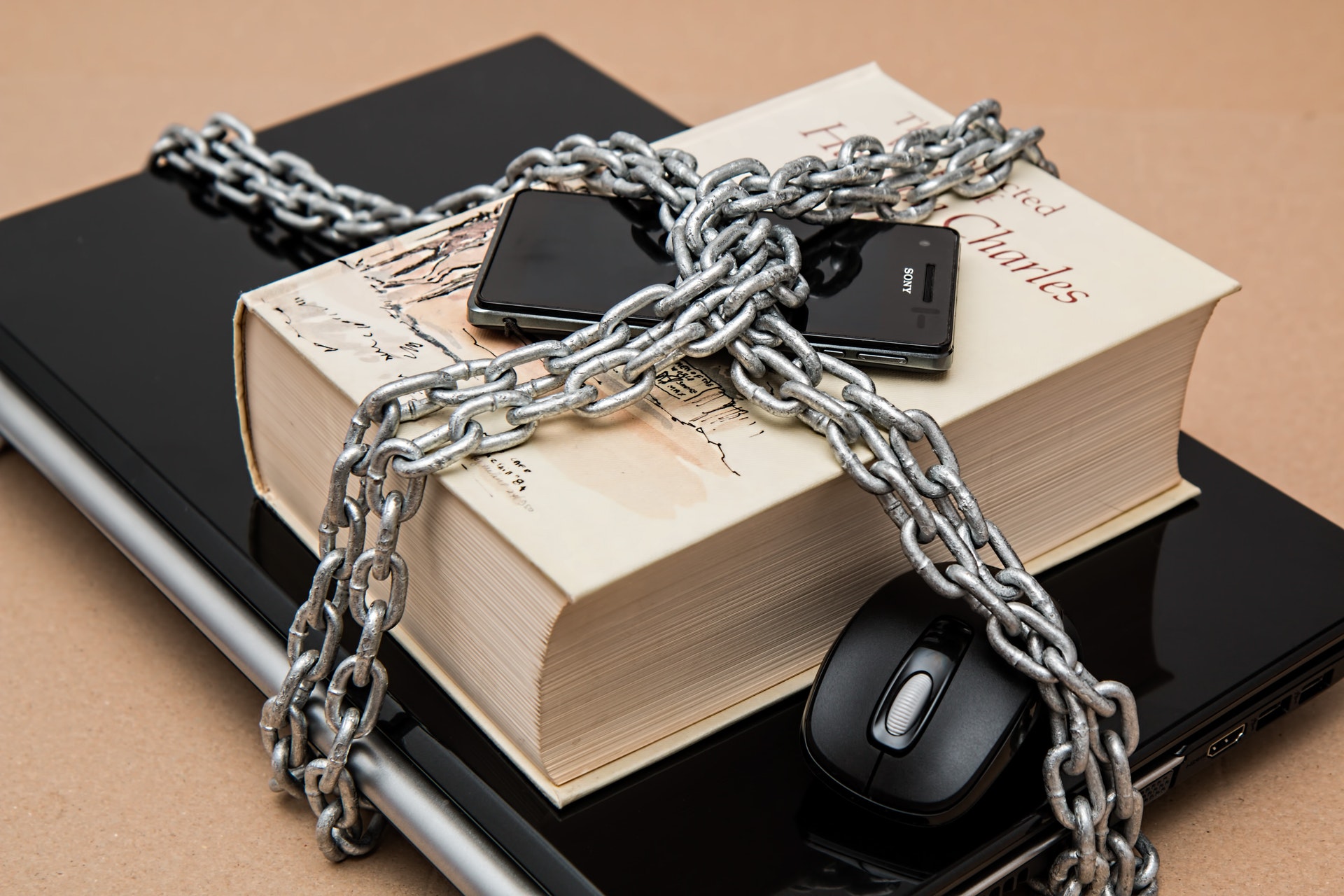 Digital devices and books chained together