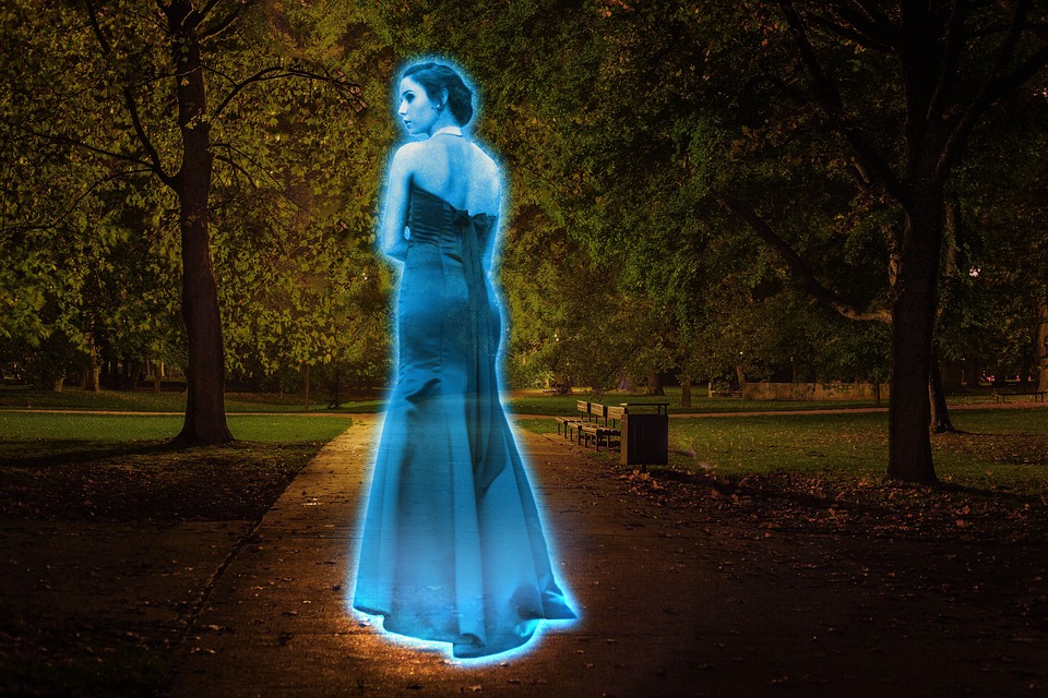 Holographic woman in a park with trees
